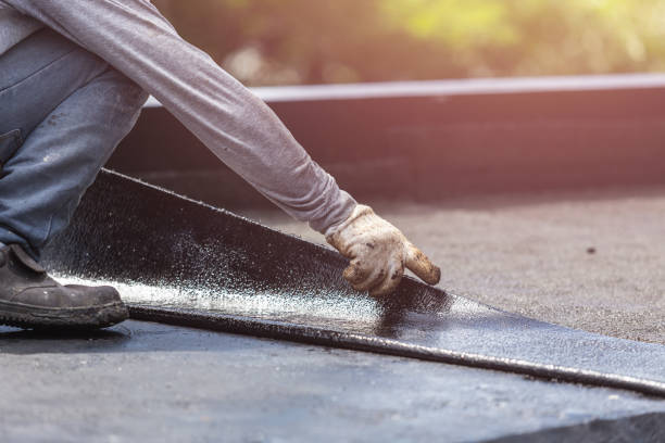 Professional Basement Waterproofing technician working in Great River, NY